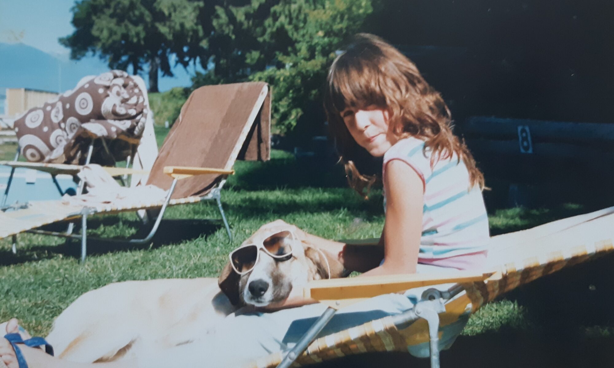 Rachael, child, with Cara, dog